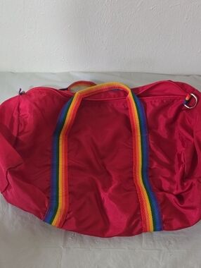Bright Red Travel Weekender with Rainbow Handles